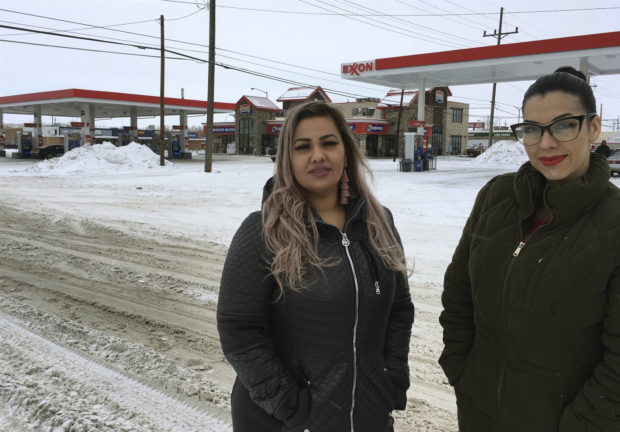 Martha Hernandez and Ana Suda in front of the convenience store where they were detained by a U.S. Border Patrol agent for speaking Spanish in Havre, Mont. The women sued the government and the border agent.Brooke Swaney / ACLU of Montana via AP file