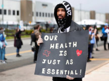 Christian Smalls stands with fellow demonstrators during a protest on Staten Island on May 1, 2020.